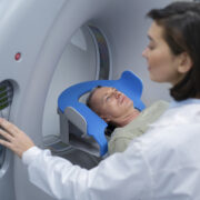 doctor-getting-patient-ready-ct-scan